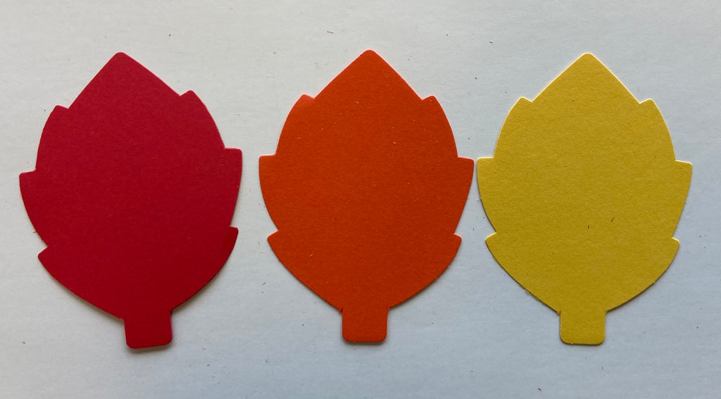 Cut leaf shapes out of multicolored construction paper. Write a
