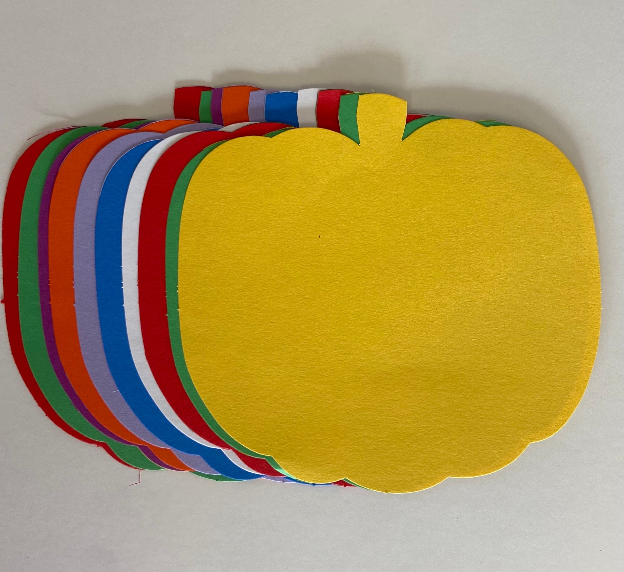 Colored Paper Pumpkin Cutouts for Halloween and Classroom Decor